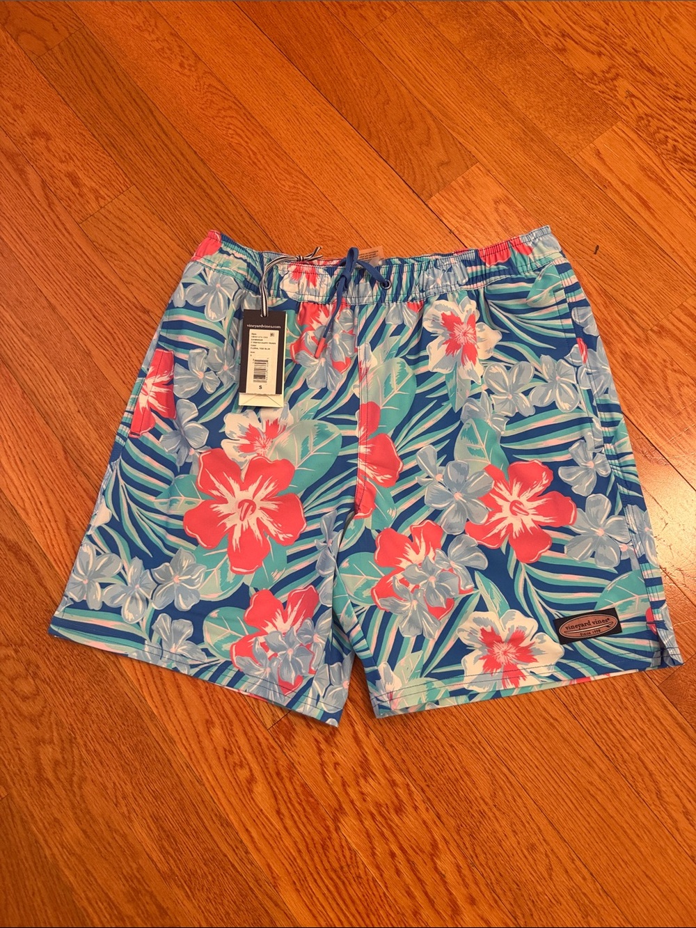 Vineyard Vines Blue Tropical Floral Swim Trunks with Coral Accents